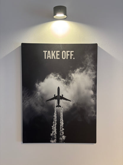 Leinwand mit einem Flugzeug und einem motivierenden Spruch "Take Off"